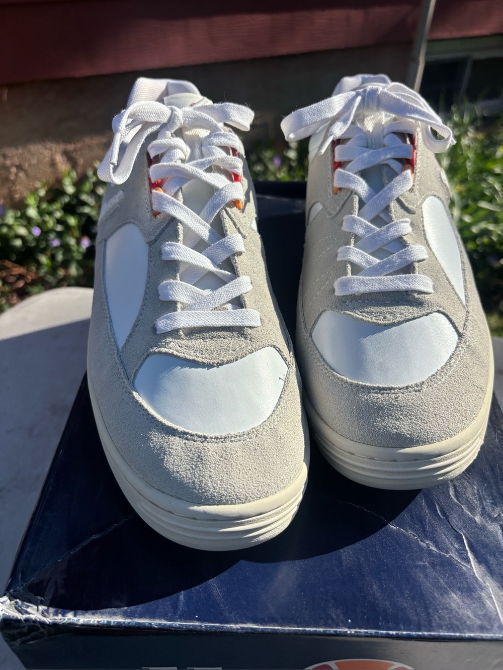 Ellesse Men’s White Sneakers with white Suede and Orange-Red Logo.